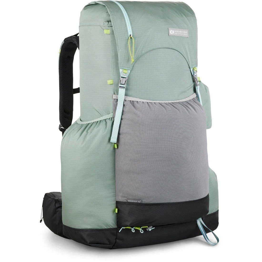 A Mariposa 60 loaded near the upper carry range on a trail at dusk, hipbelt cinched